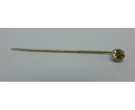 A diamond stick pin, over 0.5 carat diamond weight