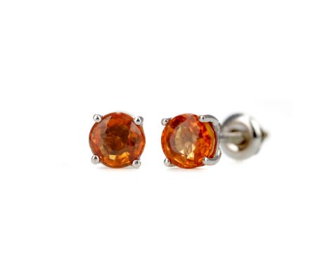 PAIR OF TREATED ORANGE SAPPHIRE STUD EARRINGS, set with round treated orange sapphires, marked 18K, with screwback fittings, 