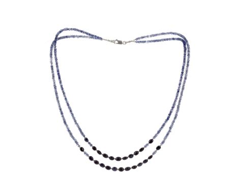 TANZANITE AND SAPPHIRE BEAD NECKLACE, formed by two rows of faceted tanzanite beads and oval sapphire beads, 47cm long, with 