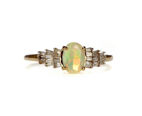 OPAL AND DIAMOND RING, set with an oval Ethiopian opal on tiered baguette cut diamond shoulders, marked 9K, size O, 1.6g