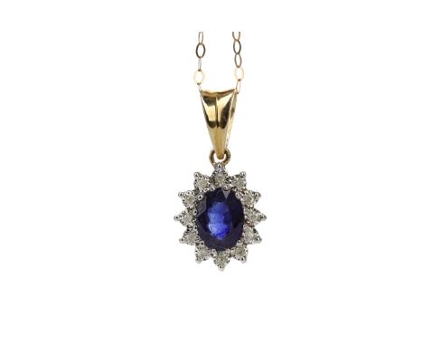SAPPHIRE AND DIAMOND PENDANT, set with an oval sapphire within a halo of illusion set diamonds totalling approximately 0.12 c