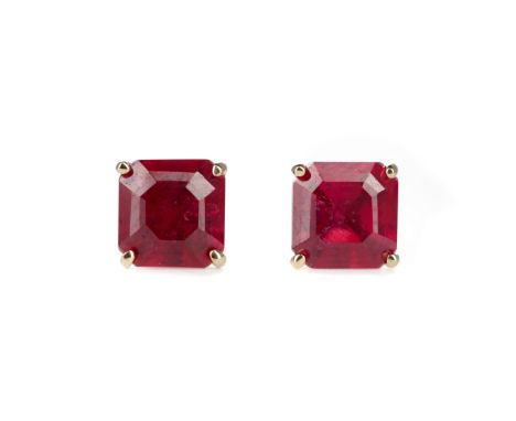 PAIR OF RUBY STUD EARRINGS, set with step cut rubies marked 375, 1.1g