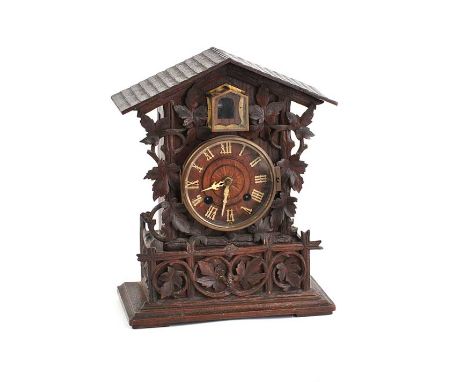 VICTORIAN CARVED OAK CASED CUCKOO CLOCK WITH CIRCULAR GLASS DIAL.HEIGHT: 17 INCHES.  WIDTH: 14 INCHES.  DEPTH: 7 INCHES.SOME 
