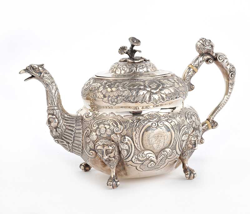 IRISH EMBOSSED SILVER TEAPOT, DUBLIN 1818. MAKER EDWARD POWER.APPROX