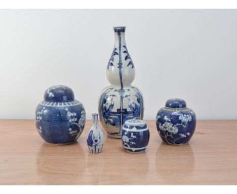 A group of early 20th century Chinese ceramic items, comprising a double gourd blue and white vase with a faux Kangxi mark, 3