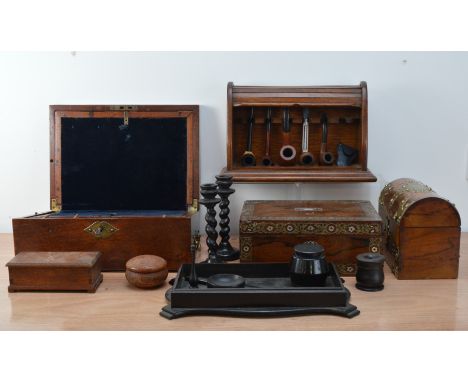 A collection of wooden works of art, comprising a mahogany writing slope, a mother of pearl and metal inlaid sewing box, 29cm