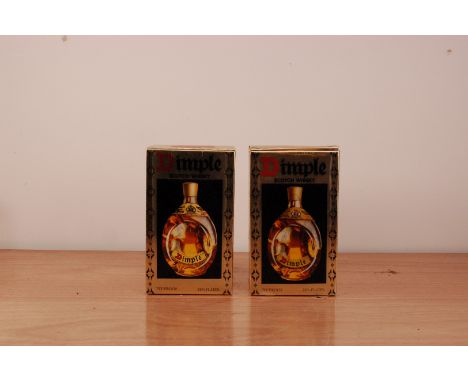 Two bottles of Dimple Scotch Whisky,  both in their presentation boxes (2)