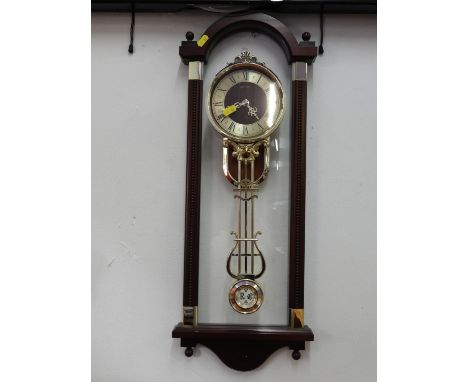 Rhythm Pendulum Wall Clock 