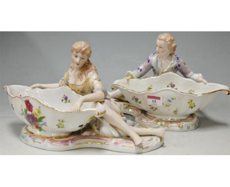 A pair of modern Meissen Dresden style porcelain figural table centrepieces, each heightened in gilt 