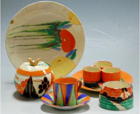 Assorted Clarice Cliff wares to include Bizarre coffee can and saucer, preserve pot (lacking cover) sundry egg cups, two plat