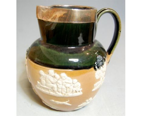 A Royal Doulton Lambeth salt-glazed stoneware hunting ware jug, having silver collar and green glazed neck 