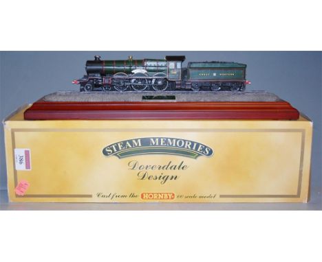 A boxed Hornby 00 gauge scale model of a GWR 4-6-0 Dunster Castle with green livery 