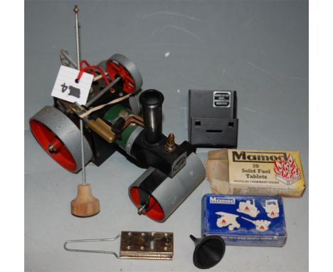 A Mamod steam engine and accessories 