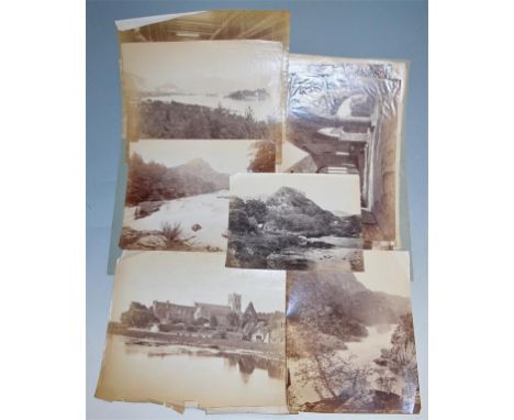 A folder of early 20th century and later photographs and prints of topographical scenes 