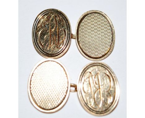 A pair of gents 9ct cufflinks, one side being engine turned, the other with monogram, 14.2g