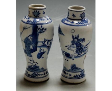Pair of Chinese export blue & white vases of slender baluster form, one decorated with a hunting scene Condition Report / Ext