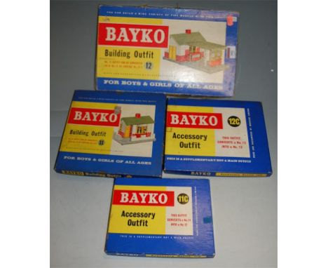 Four boxed Bayko building sets to include; building outfits Nos 11 and 12, and accessory outfits 11C and 12C (4)