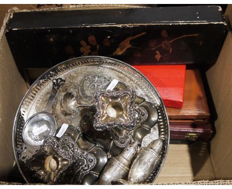 Pair of weighted sterling silver salt and pepper shakers, a pair of silver-plated candlesticks, a silver-plated tray, two Afr