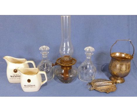 Pair of Webb Corbett cut glass decanters, two Wade Mackenzie Scotch Whisky pottery jugs, an oil lamp, a brass pot&nbsp;with h