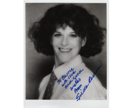 RADNER GILDA: (1946-1989) American Comedian and Actress. Scarce signed and inscribed 8 x 10 photograph of Radner in a head an
