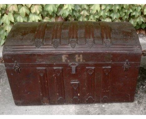 Antique Saratoga travelling trunk with original printed paper linings 