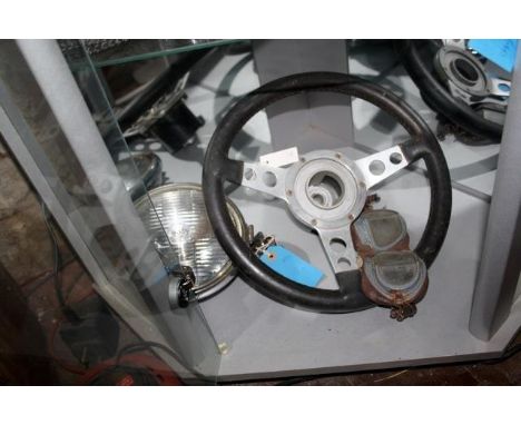 A Mini Cooper accessory aluminium and leather steering wheel, Lucas700S foglight from the same car and a pair of Mk 8 aviatio