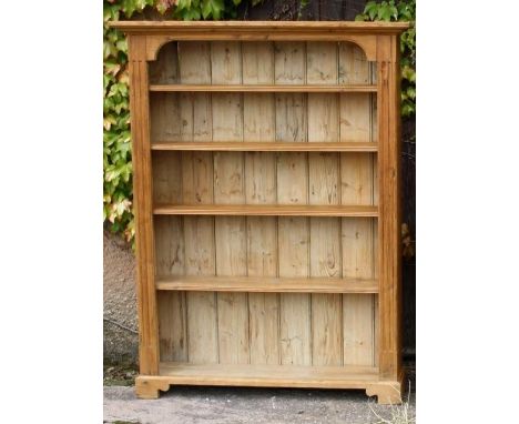Stripped pine bookcase with reeded sides on bracket feet: with full cornice and tongued and grooved back boards - 64 inches h