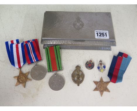 A collection of R E M E Royal Electrical Mechanical Engineers items to include a hammered steel cigarette box stamped chrome 