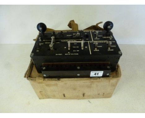 A 1943 unused lighting control switching panel for Lancaster and probably Mosquite, bears I/D no. 5C/3108 - with canvas cover