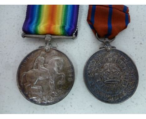 A World War One 1914-18 War Medal and a St Johns Ambulance 1911 Coronation Medal awarded to Sgt A Woodard 25951 Royal Army Me