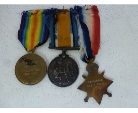 A World War I trio of 1914-15 Mons Star, 1914-18 War medal and a Victory medal awarded to S4-143545 PTE W Groom Army Service 