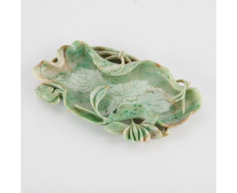 Antique Chinese jade brush washer in the form of a lily pad, of a lovely mottled celadon jade with a few pale russet inclusio