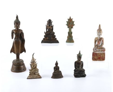 Group of seven 19th century and earlier Thai buddha figures. Six are beautifully cast bronze; one is carved wood, with some r