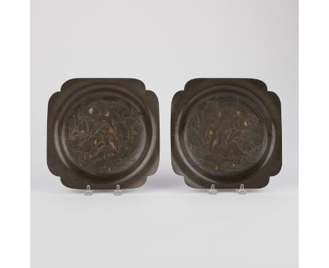 Pair of Chinese 18th-century bronze plates with silver and gold inlay decoration depicting flowers and lily pads along a pond