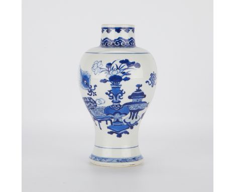 Chinese Kangxi period blue and white porcelain vase with a high shoulder. The decoration along the exterior depicts a scene o