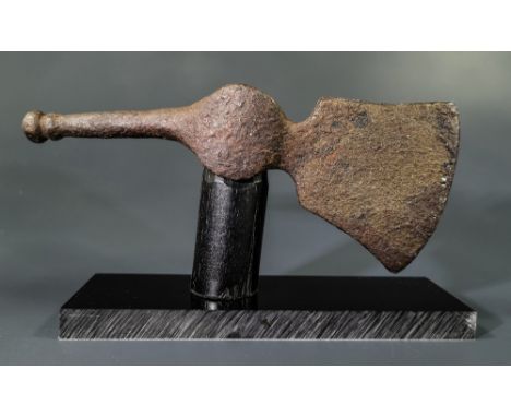 Ca.700-900 AD A Beautiful Medieval Viking iron axe head composed by a large bell shaped blade with a reverse composing of a t