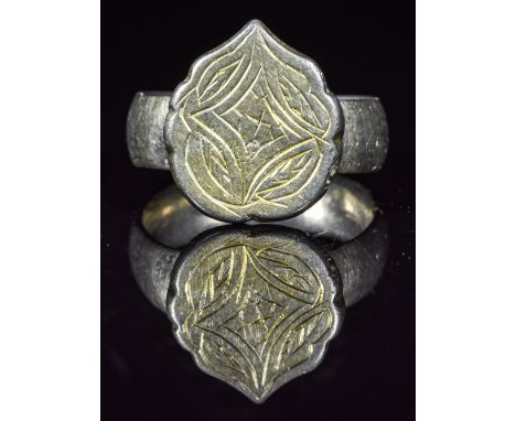 Ca.1200 AD. Wonderful Knights Templar Silver gilt ring with teardrop shaped bezel depicting stylized floral and a cross in th