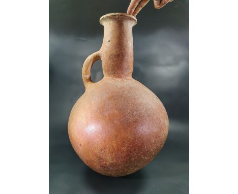 Ca. 2300-1650 BC , Attractive polished ceramic amphora with bulbous body, slim cylindrical neck with single handle; Repaired;