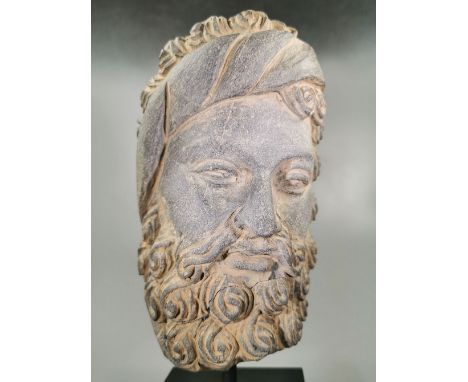 Ca.350 AD. A lovely head in dark grey schist, native to the valleys that runs along the rivers of Afghanistan and Pakistan. T