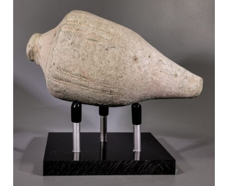 Ca.800 AD. A hollow ceramic vessel with barrel-shaped body, domed top and conical base, the body with geometric motifs; knop 