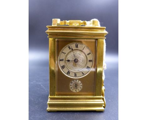 A FRENCH GORGE CASED ALARM CARRIAGE CLOCK, THE REPEAT BUTTON ABOVE CIRCULAR SILVERED DIALS, THE STRIKE AND ALARM ON A BELL.  