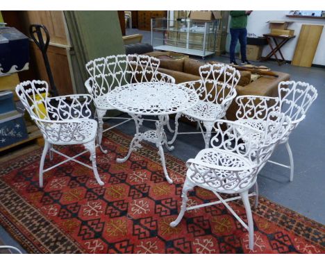 A GOOD VICTORIAN STYLE CONSERVATORY/ PATIO SET OF FOUR CHAIRS, A TWO SLAT BENCH AND A CIRCULAR TABLE.