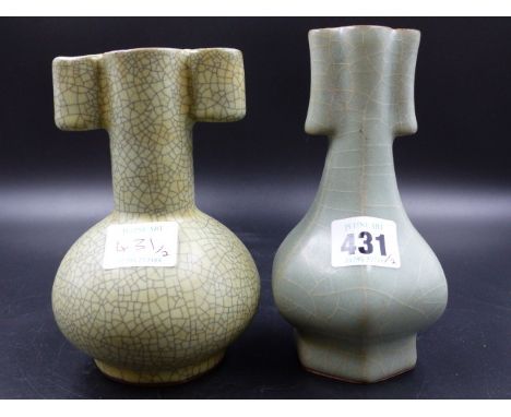 TWO CHINESE GUAN TYPE ARROW VASES, ONE WITH BLACK CRACKLED GREEN GLAZE.  H.14.5CMS   THE OTHER WITH WHITE CRACKLED CELADON GL