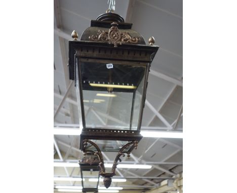 A gilt and patinated metal lantern, late 20th century, of tapering square form, with gilt foliate surmounts and embellishment