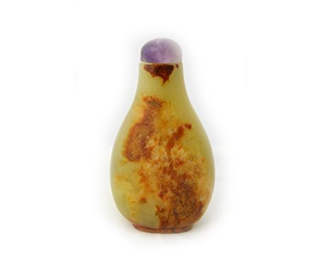 A Chinese yellowish celadon and russet jade snuff bottle, of pear form, faintly incised on one side with a man seated below a
