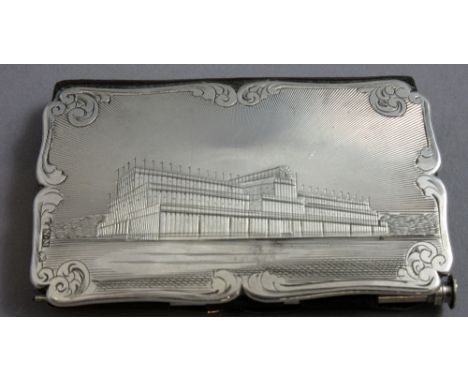 A Victorian silver mounted aide memoire, the front cover engraved with a view of The Crystal Palace within a scroll border, t