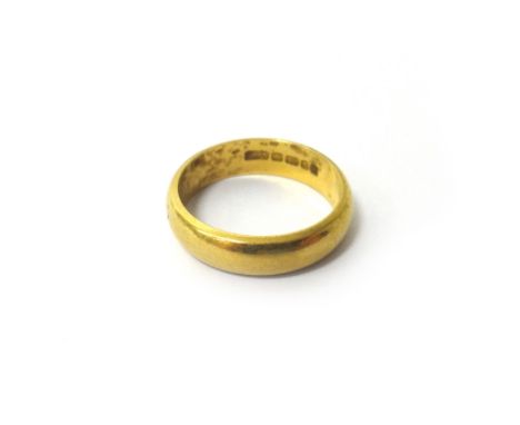 A 22ct gold plain wedding ring, London 1966, ring size K and a half, weight 5 gms.