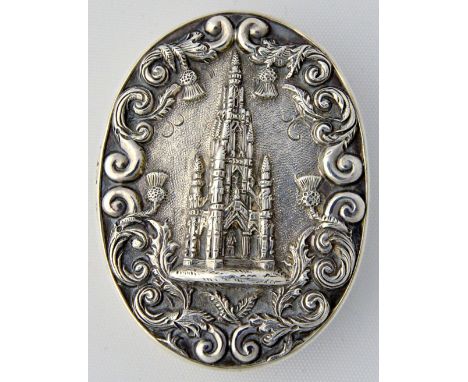 A Victorian silver 'castle top' vinaigrette of oval form, the lid with a raised scene of The Scott Memorial, Edinburgh surrou