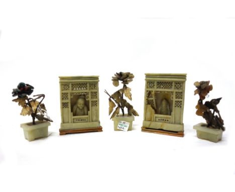 Three Chinese miniature jade and gilt-metal mounted floral jardinieres, 9cm.high; and a pair of soapstone panels, each with a