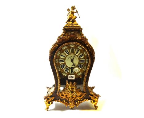 A Louis XV ormolu mounted boulle bracket clock by 'Etienne Le Noir, Paris', with cherub surmount over a glazed baluster case 